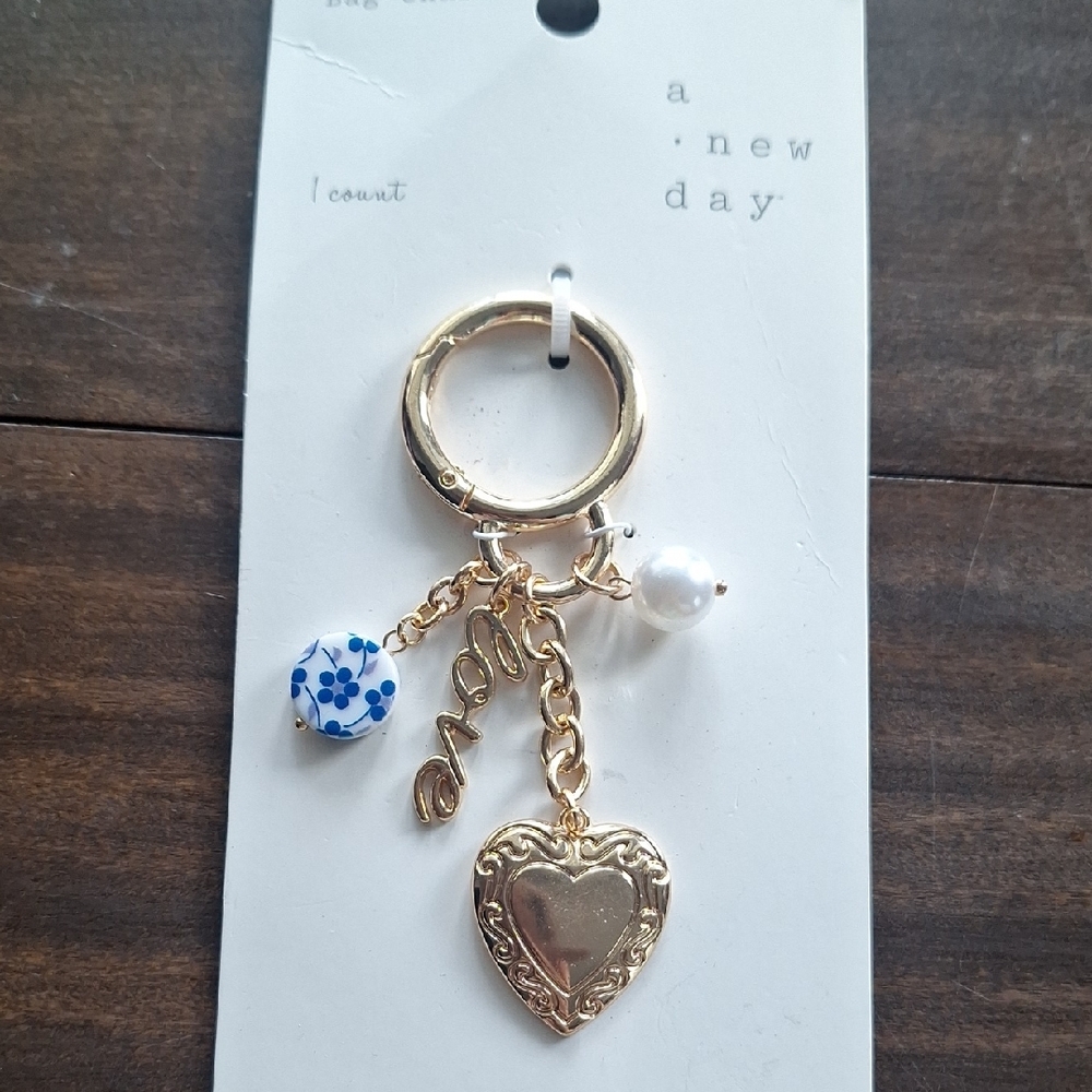 A New Day Gold Heart Bag Charm with Charms